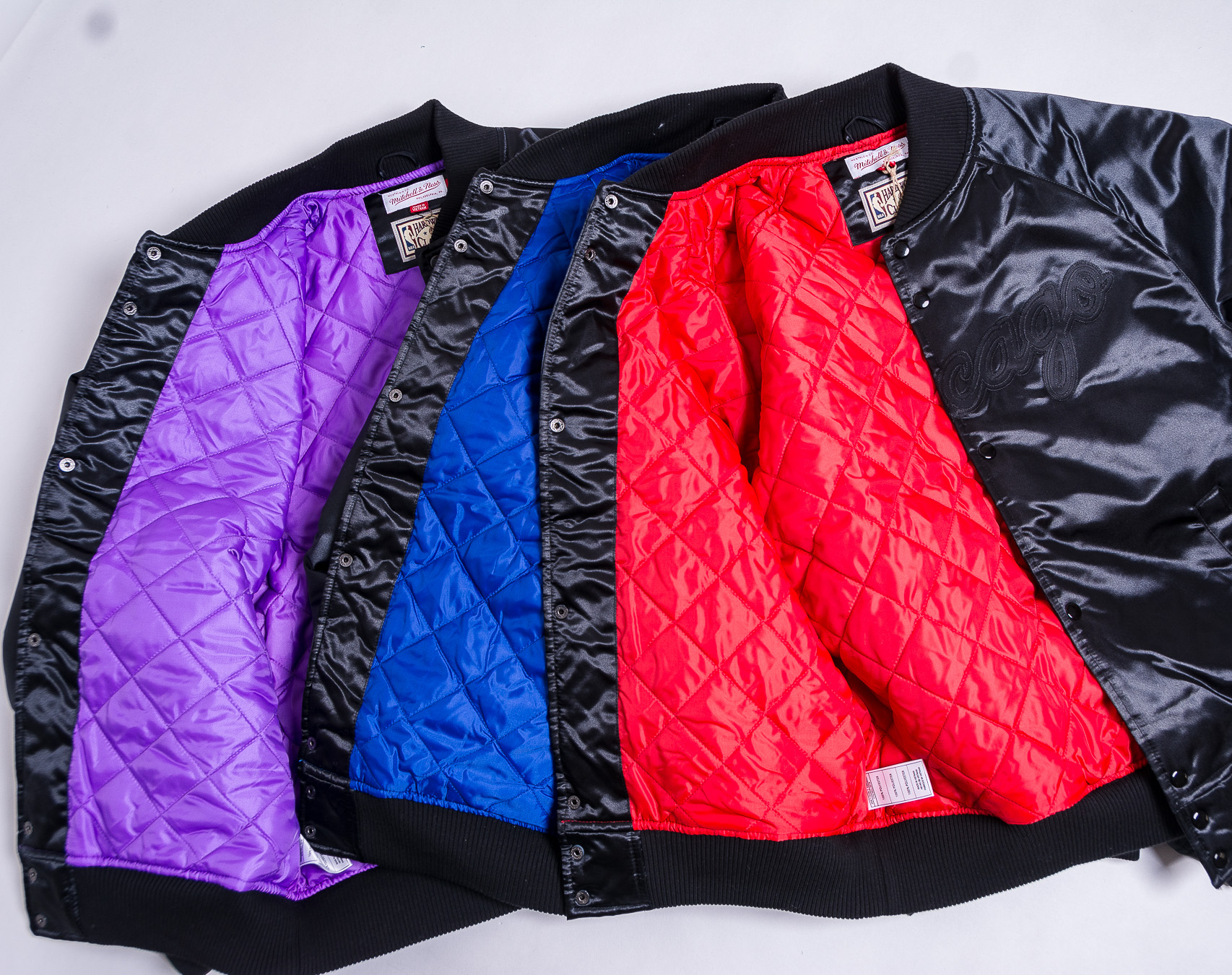 Bunda pánská Mitchell & Ness New York Knicks Tough Season Satin Jacket Tonal Black
