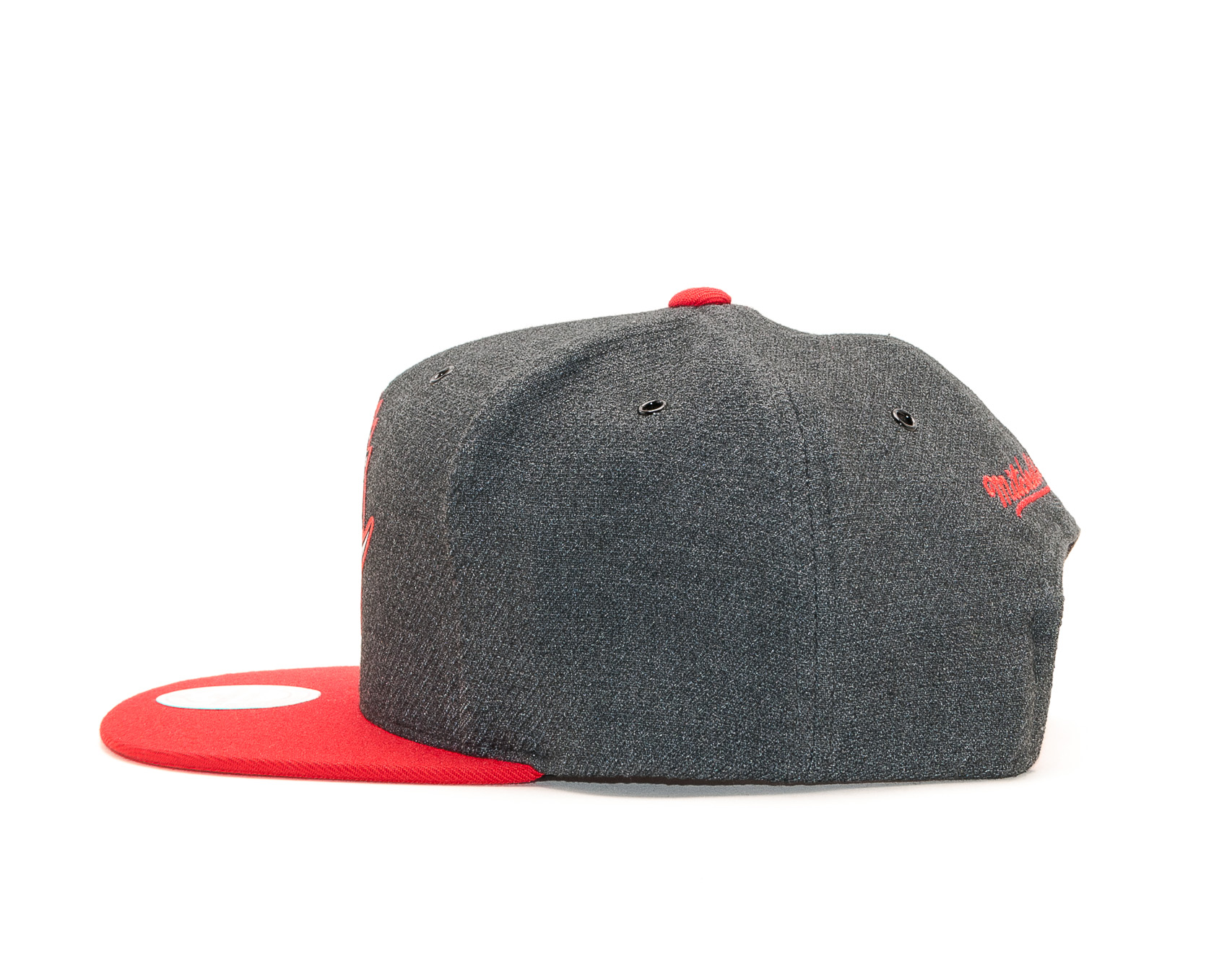 Kšiltovka Mitchell & Ness Toronto Raptors Hardwood Classic Woven Reflective Charcoal/Red Snapback