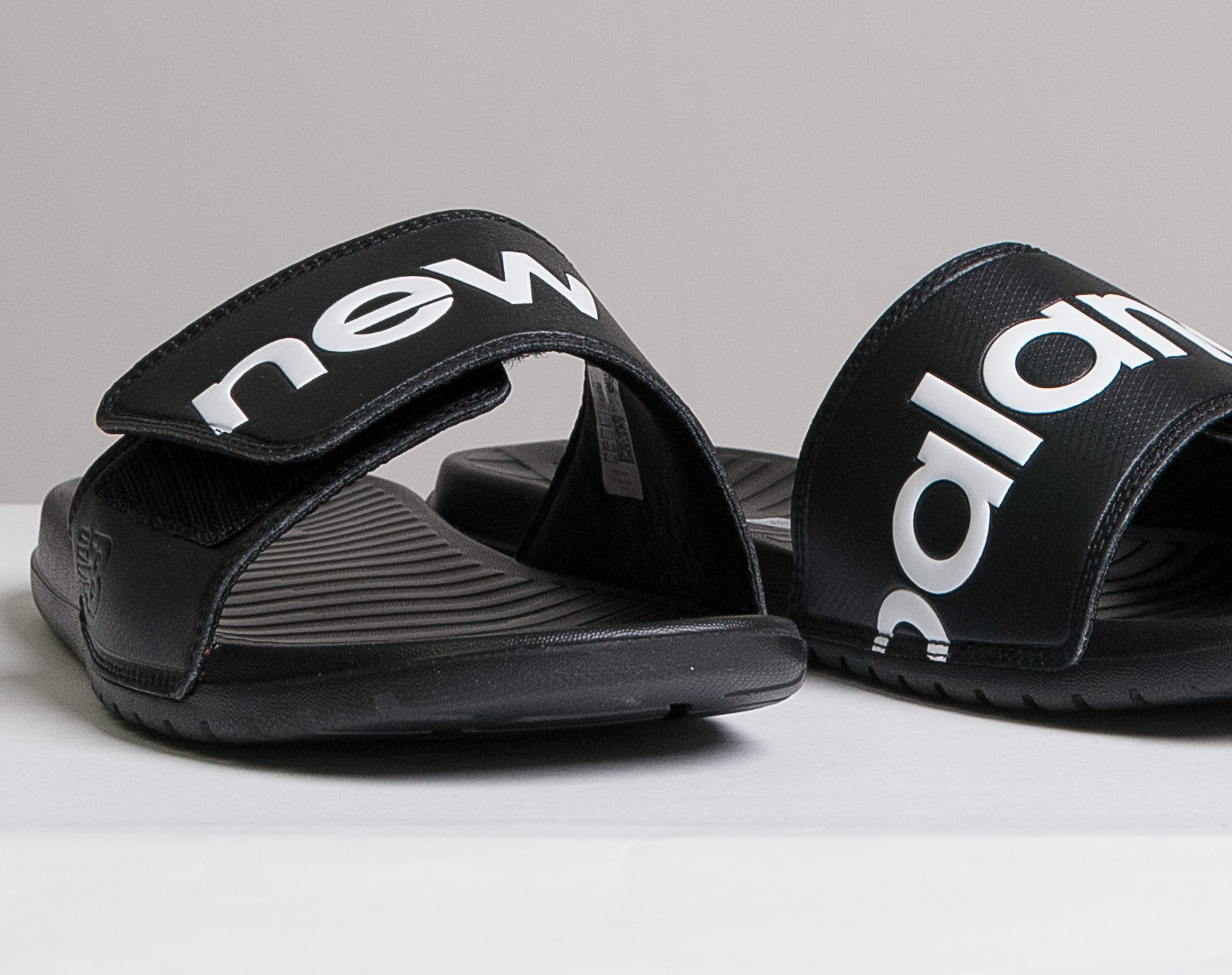 Pantofle pánské New Balance SDL230BK Black/White